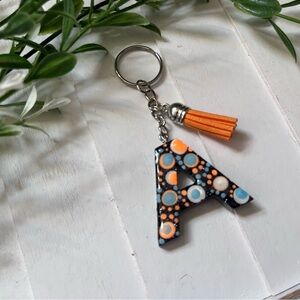 Monogram 'A' Keychain with Orange Tassel